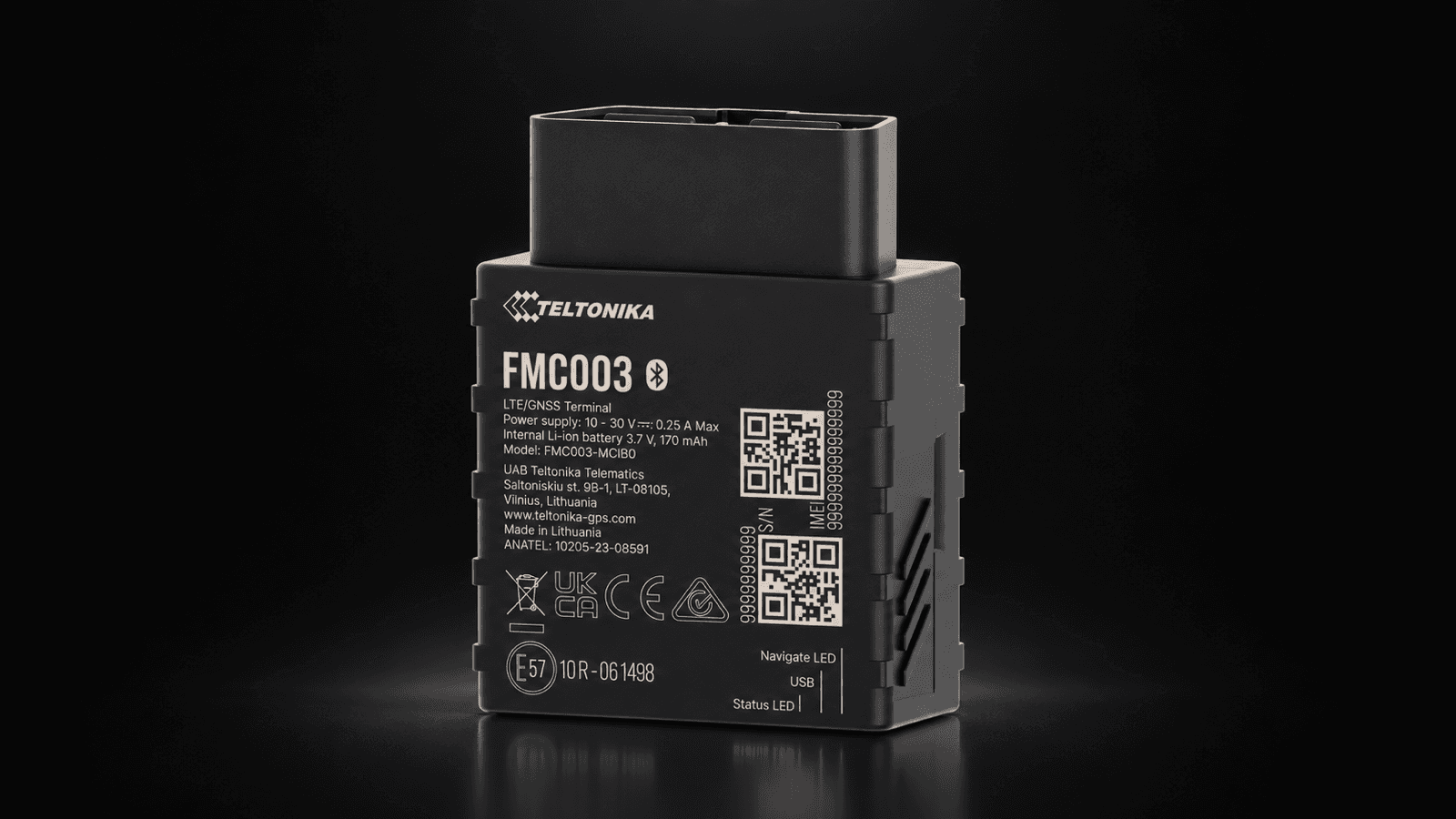Teltonika FMC003 OBD tracker with plug connector on a dark studio background